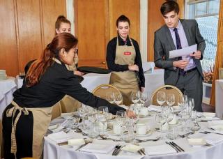waitresses learning how to set a table